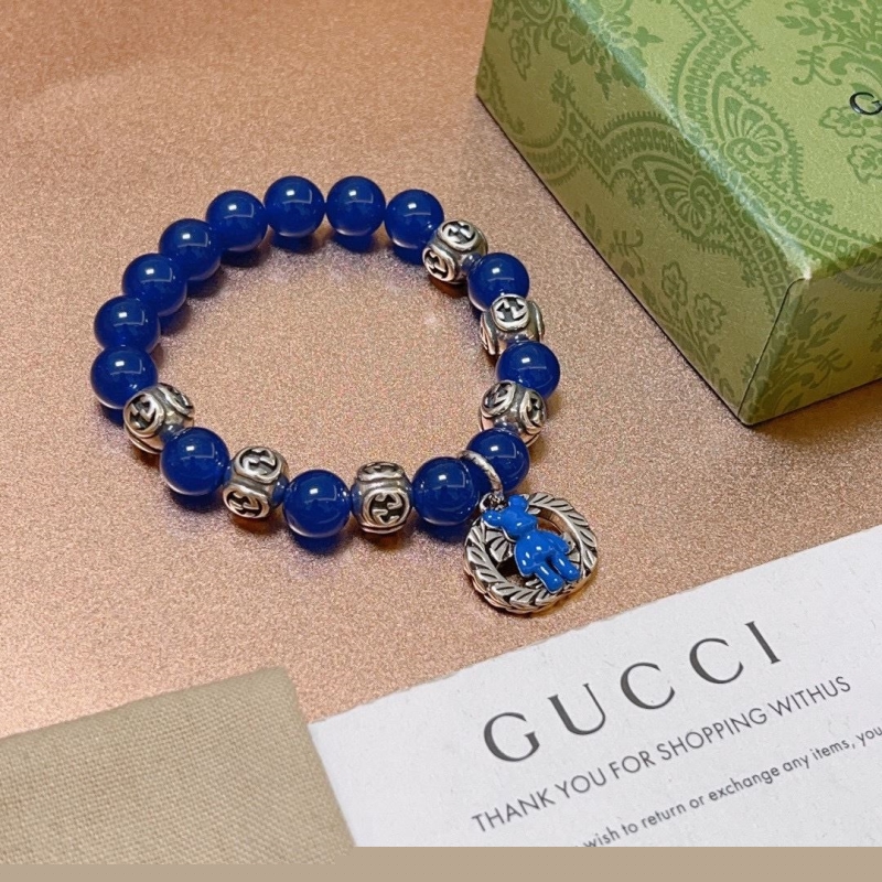 G*u*i bracelets